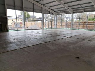 commercial liquid screed warehouse floor Wales