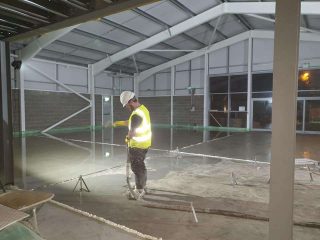 commercial liquid screed warehouse floor Wales